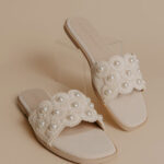 The Cathleen Raffia Woven Embellished Sandal in Ivory